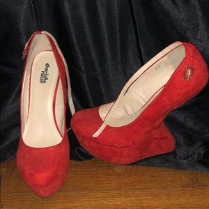 Used inverted suede heels